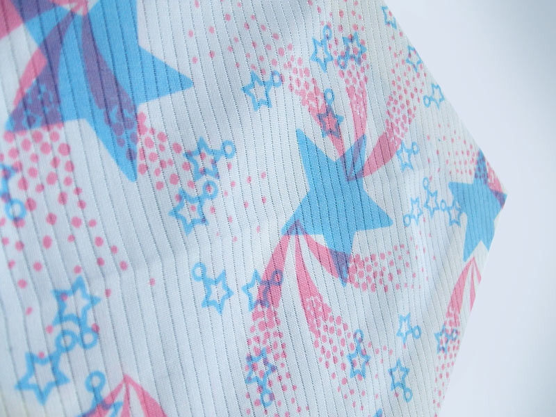 White cotton fabric with stars and comets